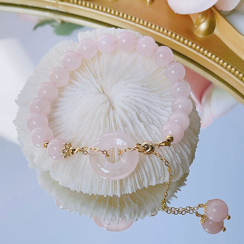 Buddha Stones natürliches rosa Kristall-Friedensschnalle-Liebes-Charm-Armband