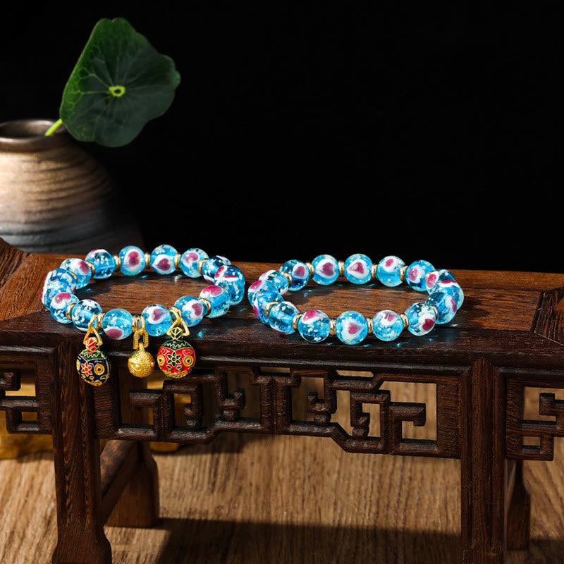 Buddha Stones Gold Schluckendes Biest Familie Rosa Liebesherz Leuchtendes fluoreszierendes Liuli-Glasperlenarmband