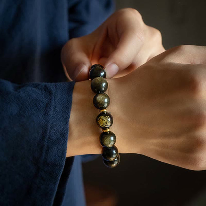 Chinesisches Tierkreis-Natal-Buddha-Goldglanz-Obsidian-Armband zum Schutz des Reichtums