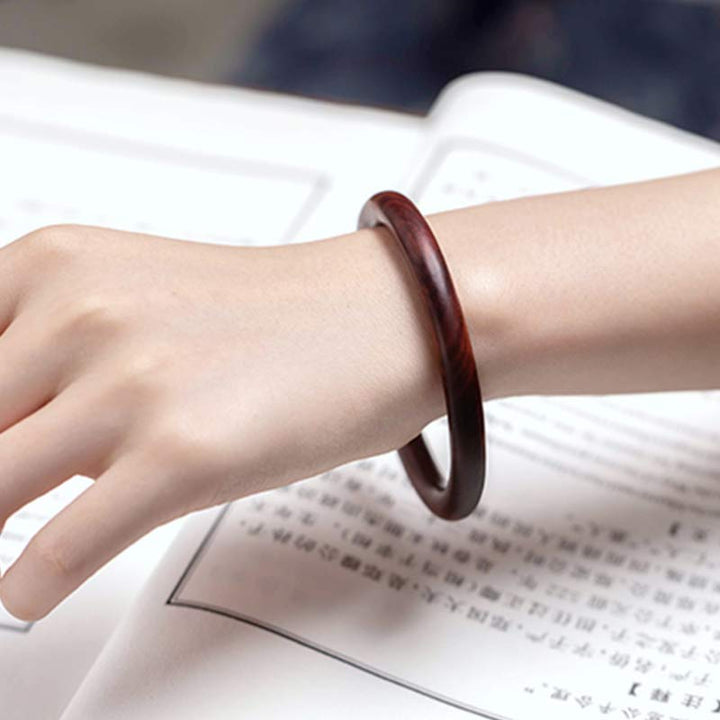 Buddha Stones Tibetisches kleines Blatt rotes Sandelholz Ebenholz grünes Sandelholz Schutzarmband Armreif