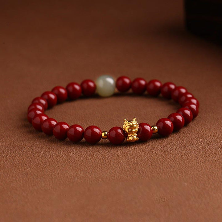 Buddha Stones 999 Gold Jahr des Drachen natürliches Zinnober-Jade-Kupfer-Münze-Fu-Charakter-Segen-Armband