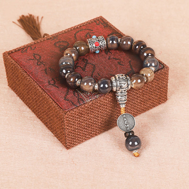 Buddha Stones Tibet Om Mani Padme Hum Gebetsmühle Dorje Vajra Graviertes Glasperlen-Weisheitsarmband