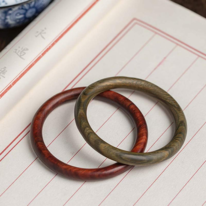 Buddha Stones Tibetisches kleines Blatt rotes Sandelholz Ebenholz grünes Sandelholz Schutzarmband Armreif