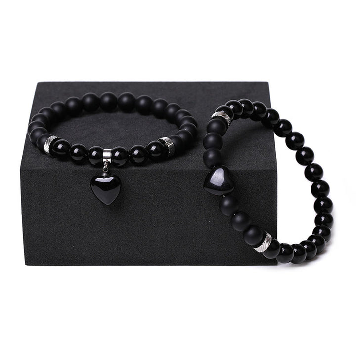 Buddha Stones 2-teiliges schwarzes Onyx-Kristall-Stein-Liebes-Herz-Schutz-Unterstützungs-Paar-Armband