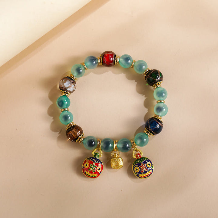 Buddha Stones, buntes Bonbon-Achat-Gold, schluckendes Biest, Familie Liuli, Glasperlen, Stärke-Armband
