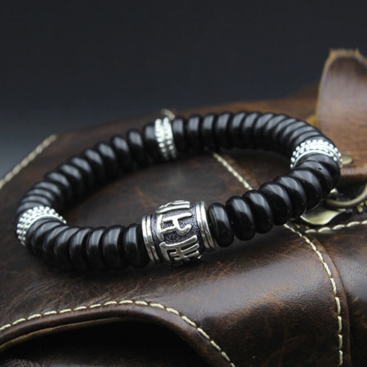 Buddha Stones Natürliches tibetisches Om Mani Padme Hum Positive Armband aus Kokosnussschale