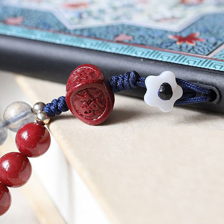 Natürlicher Mondstein, Zinnober, ruhige, positive Telefondekoration