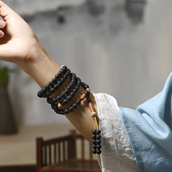 Buddha Stones Tibetisches Mala-Zypressen-Bodhi-Samen-Heilarmband aus rotem Achat