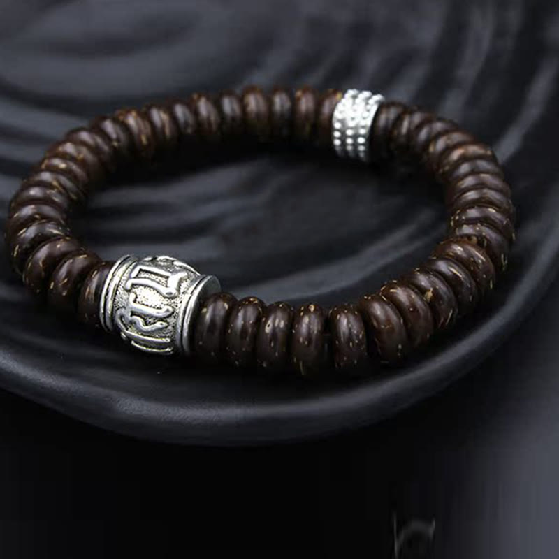 Buddha Stones Natürliches tibetisches Om Mani Padme Hum Positive Armband aus Kokosnussschale