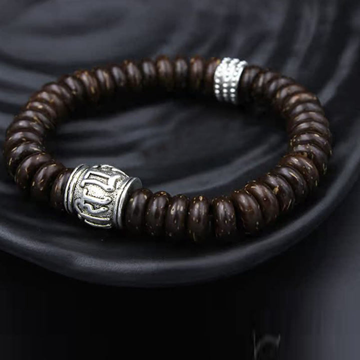 Buddha Stones Natürliches tibetisches Om Mani Padme Hum Positive Armband aus Kokosnussschale