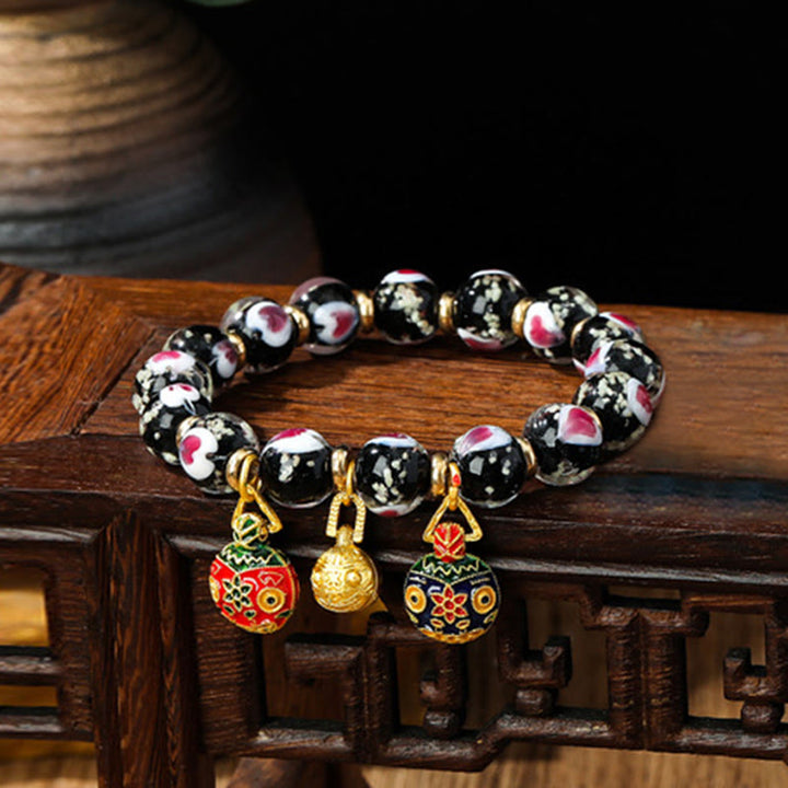 Buddha Stones Gold Schluckendes Biest Familie Rosa Liebesherz Leuchtendes fluoreszierendes Liuli-Glasperlenarmband