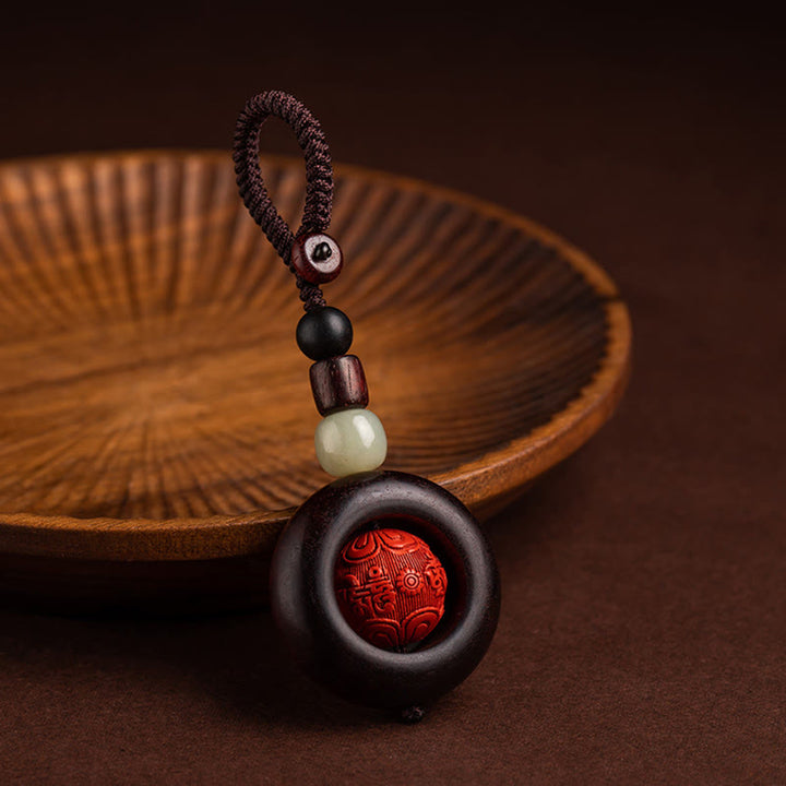 Buddha Stones, Tibet, Om Mani Padme Hum, PiXiu, Kupfermünze, kleines Blatt, rotes Sandelholz, Zinnober, Schutz-Schlüsselanhänger