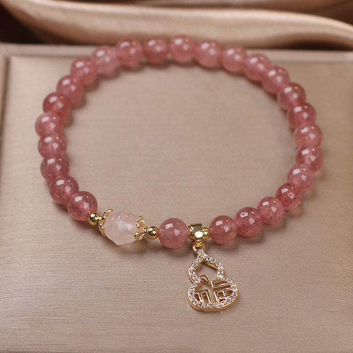 Buddha Stones Armband, Motiv: Erdbeerquarz, Kürbis, Fu, positiver Charm