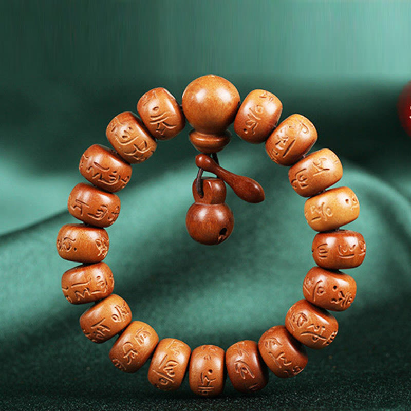 Buddha Stones Armband aus natürlichem tibetischem Pfirsichholz mit Om Mani Padme Hum-Gravur zur Abwehr böser Geister