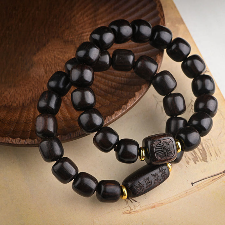 Buddha Stones Tibetisches Ebenholz-Fassperlen-Armband mit Glücks- und Schatz-Balance