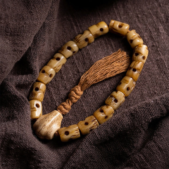 Armband aus tibetischem Yakknochen mit Buddha-Steinen, „Der Herr des Leichenwaldes“, um böse Geister fernzuhalten