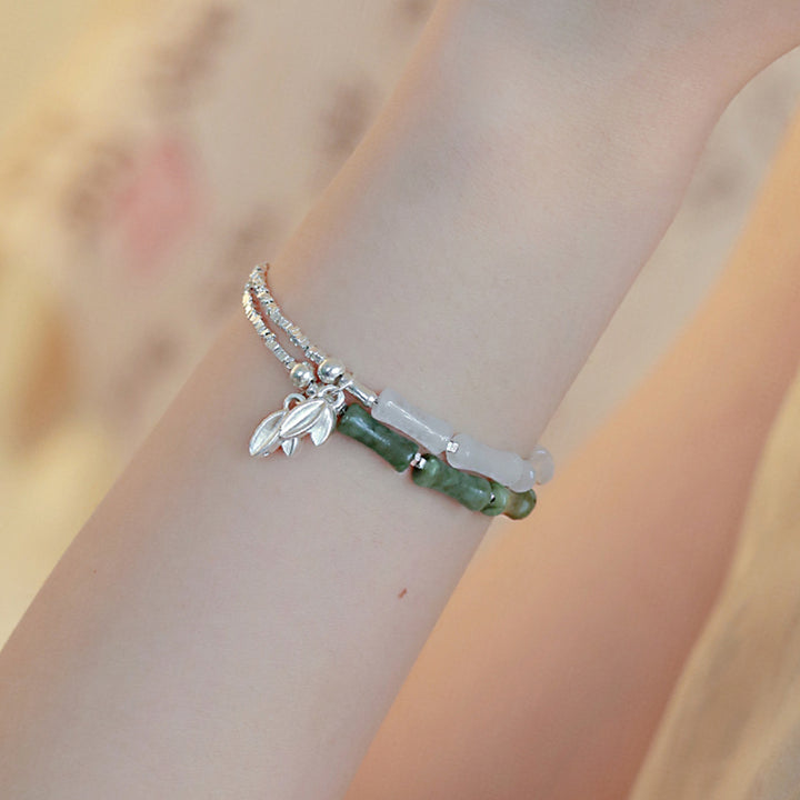 Buddha Stones Glücksarmband aus 925er-Sterlingsilber mit Peridot und Bambusmuster - image 11