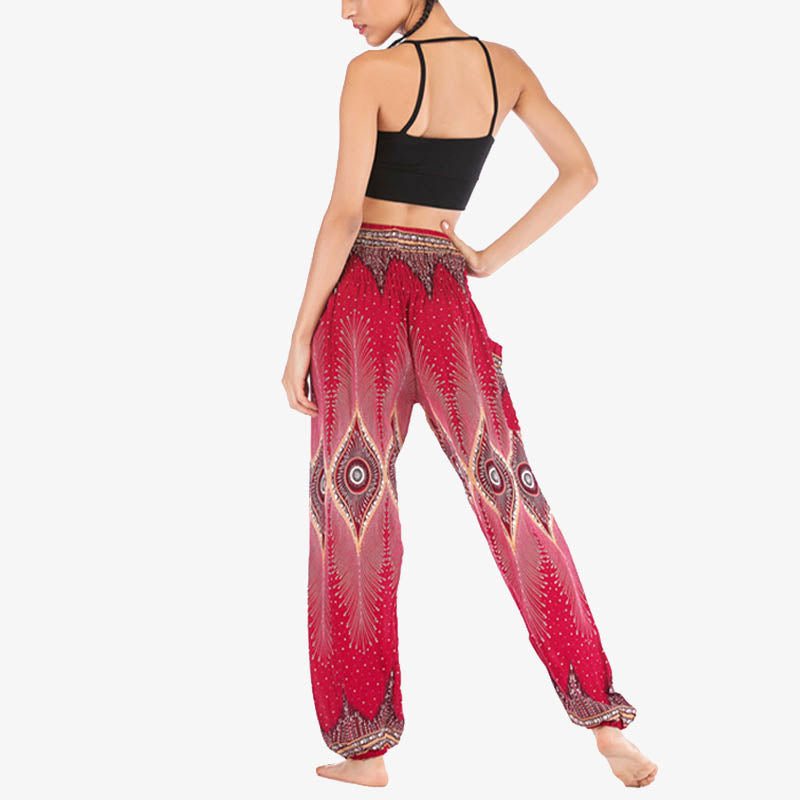 Buddha Stones Herren-Yogahose mit Pfauenfedern, lockere, gesmokte Haremshose mit kleinem Auge und Pfauenfedern - image 4