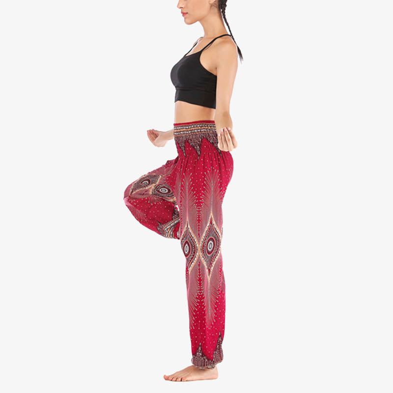 Buddha Stones Herren-Yogahose mit Pfauenfedern, lockere, gesmokte Haremshose mit kleinem Auge und Pfauenfedern - image 3