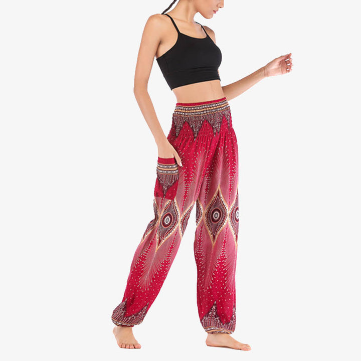 Buddha Stones Herren-Yogahose mit Pfauenfedern, lockere, gesmokte Haremshose mit kleinem Auge und Pfauenfedern - image 11