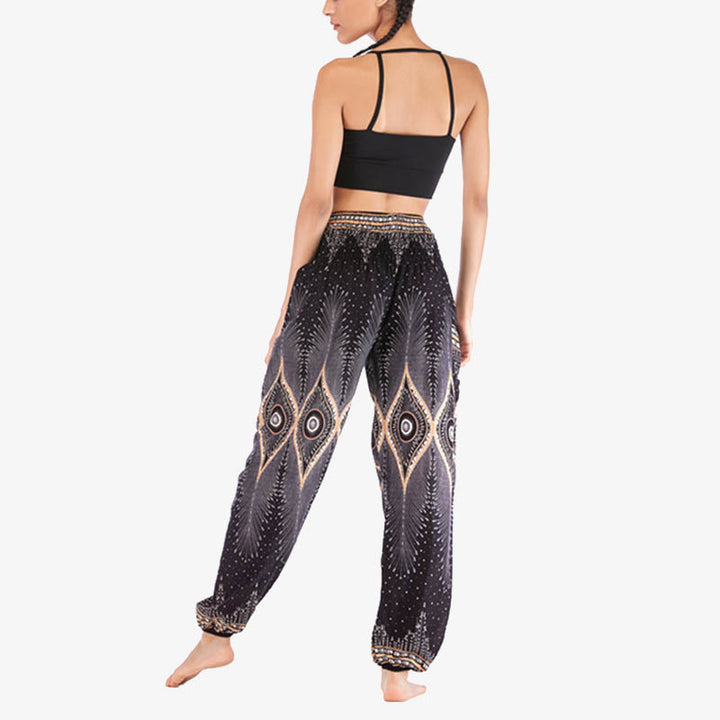 Buddha Stones Herren-Yogahose mit Pfauenfedern, lockere, gesmokte Haremshose mit kleinem Auge und Pfauenfedern - image 15