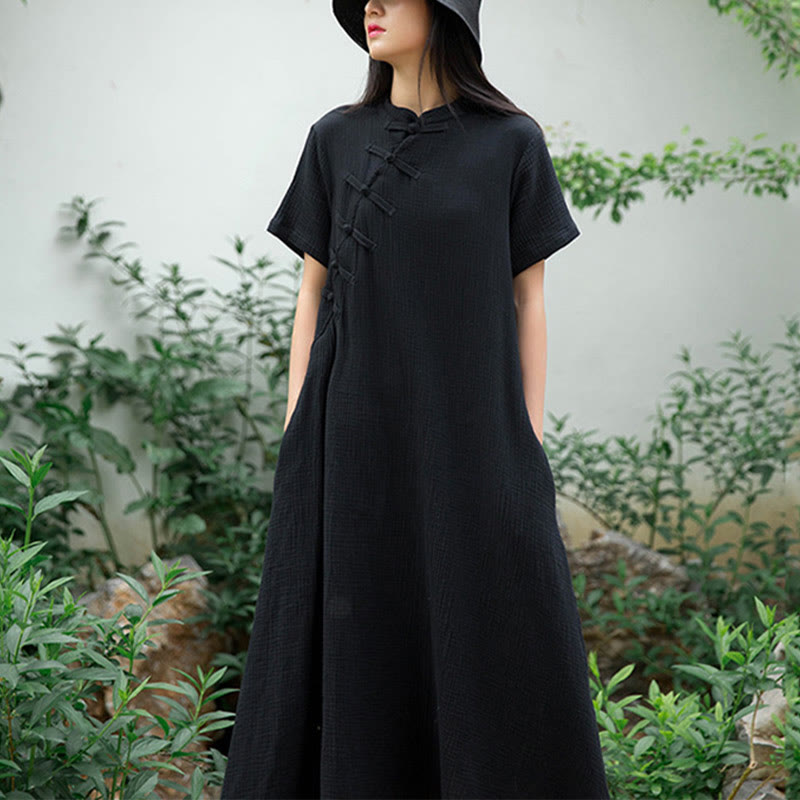 Buddha Stones – Midikleid mit Froschknöpfen, kurzärmliges Kleid aus Baumwollleinen mit Taschen - Schwarz (Brustumfang 96 cm/Länge 119 cm) (nur Kleid) - image 0