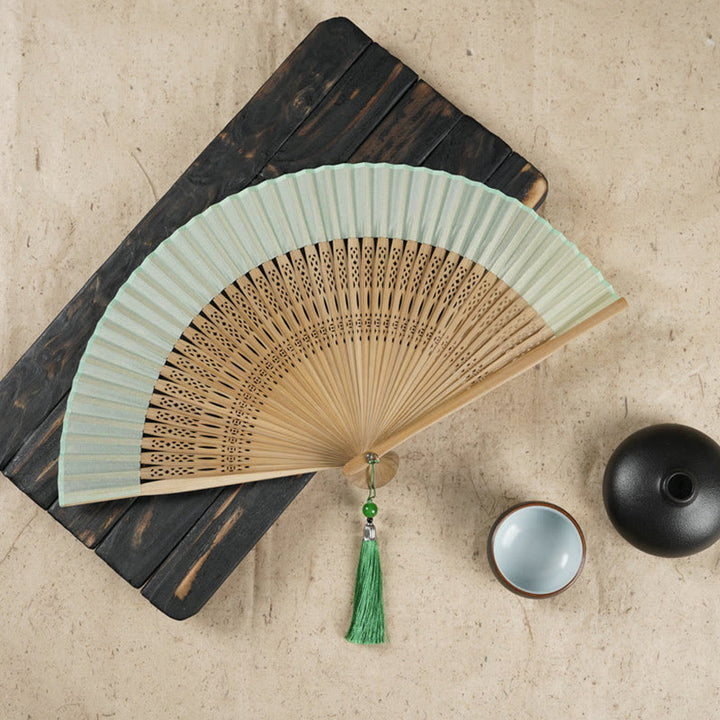 Handlicher Faltfächer aus Bambus mit Buddha-Steinen, einfacher Kirschblüten-Gravur - Grün, 22 cm - image 0