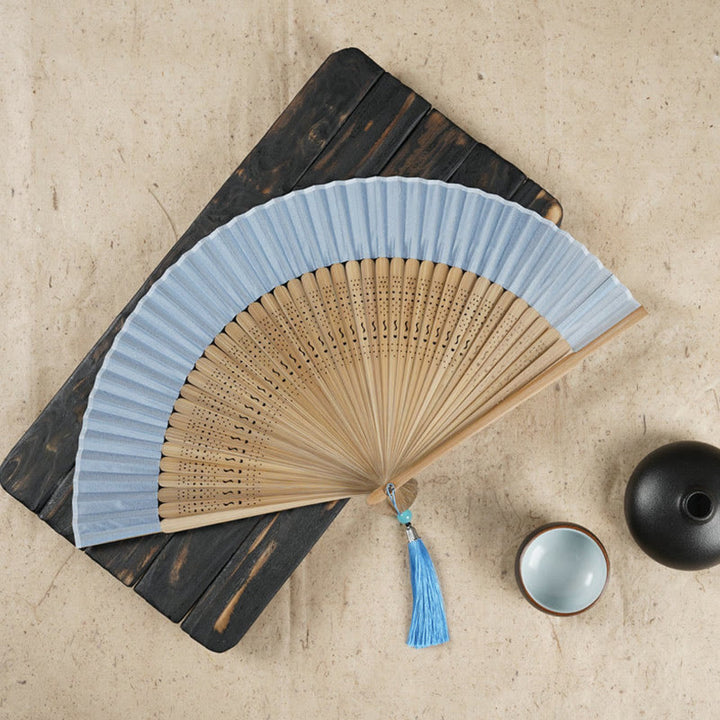 Handlicher Faltfächer aus Bambus mit Buddha-Steinen, einfacher Kirschblüten-Gravur - Blau, 22 cm - image 6