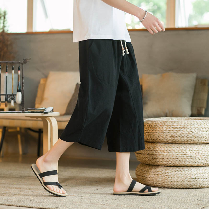 Buddha Stones - Einfarbige mittellange Herrenhose aus Leinen mit weitem Bein und Taschen - Schwarz - US/ UK/AU46，EU56 (5XL) - image 1