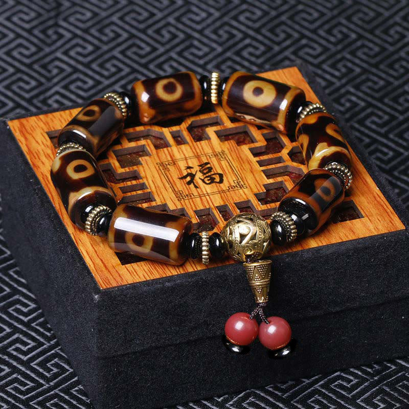 Buddha Stones Tibetisches Neun-Augen-Dzi-Perlen-Glücks-Charm-Armband - Neunäugige Dzi-Perle (Handgelenkumfang: 18-19 cm) - image 0