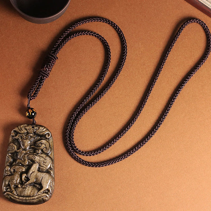 Halskette mit Anhänger aus Obsidian mit Buddha-Steinen und Goldglanz, drei Ziegen bringen Glück und Reichtum