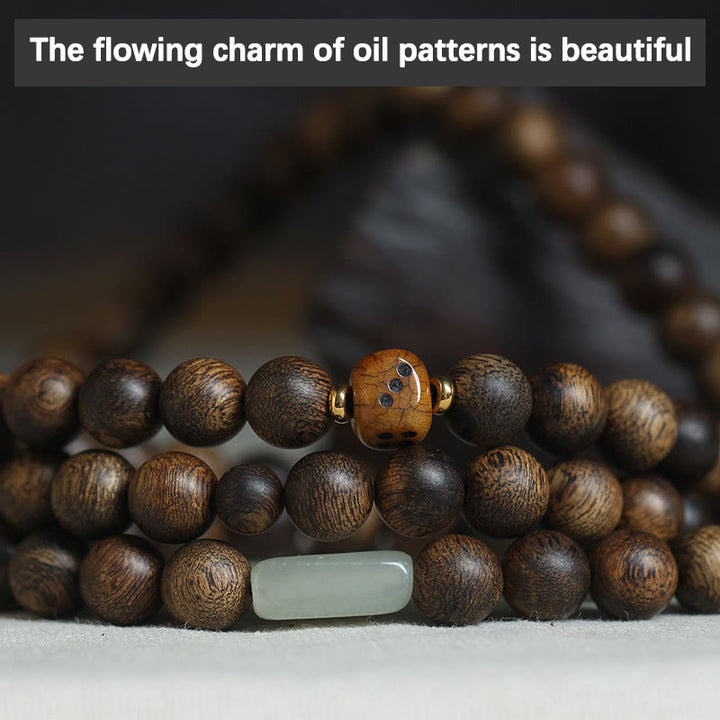 Buddha Stones 108 Mala-Perlen Brunei Adlerholz Hetian Jade Yakknochen Stärke Balance Armband