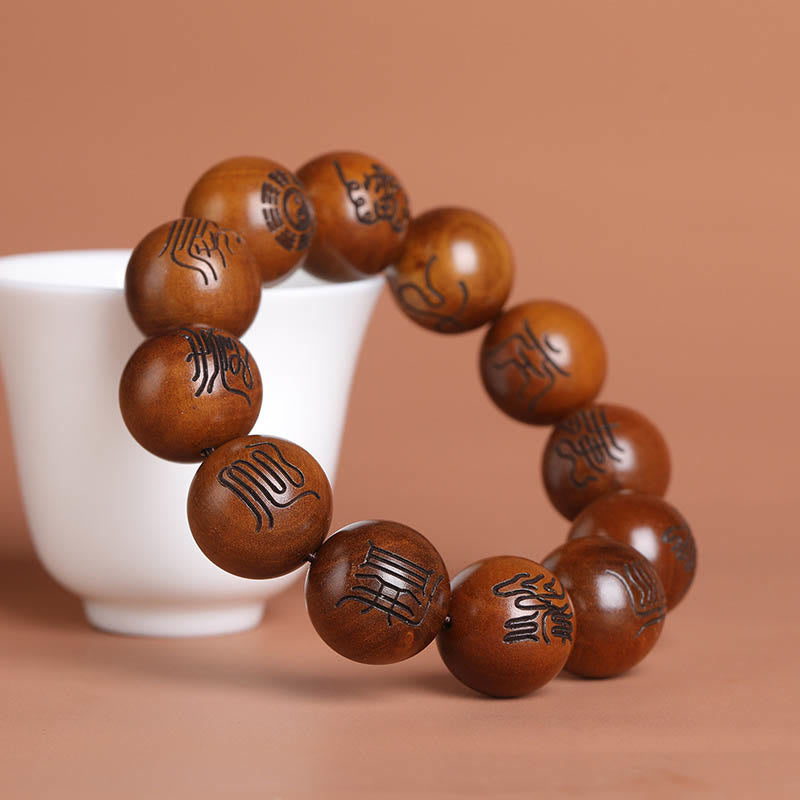 Armband mit eingraviertem Glückssymbol und Buddha-Steinen aus Jujube-Holz mit Yin-Yang-Baguas und taoistischem Tabu-Symbol