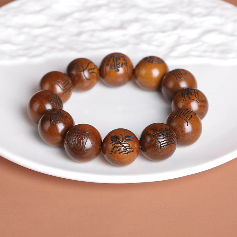 Armband mit eingraviertem Glückssymbol und Buddha-Steinen aus Jujube-Holz mit Yin-Yang-Baguas und taoistischem Tabu-Symbol