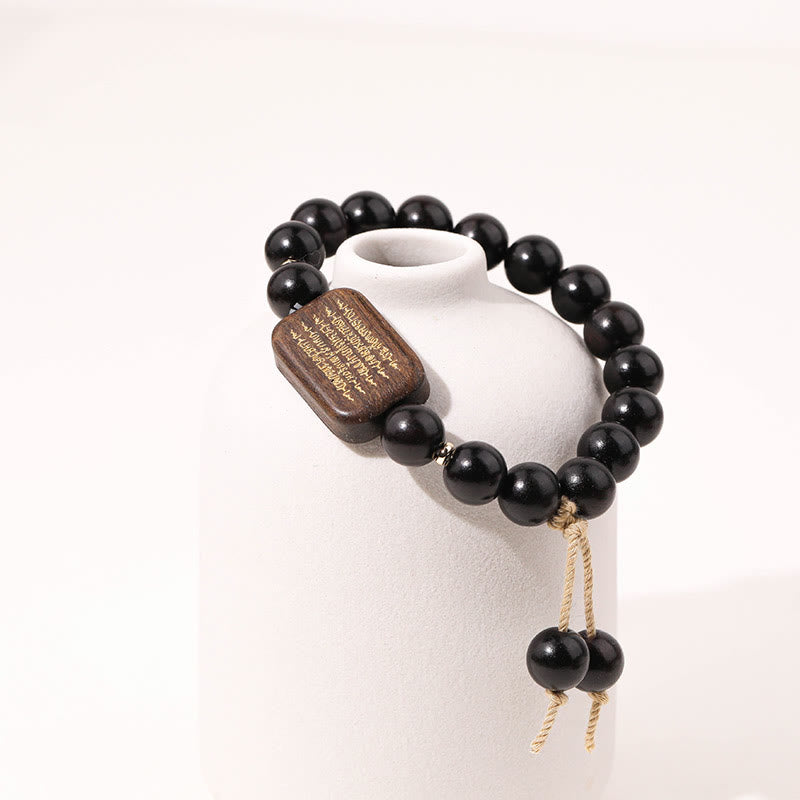 Buddha Stones Ebenholzschnitzerei mit Friedensgebet-Armband