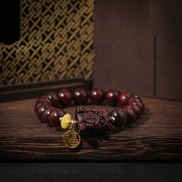 Buddha Stones Small Leaf Red Sandelholz Gold verschlingendes Biest Ruhiges Armband