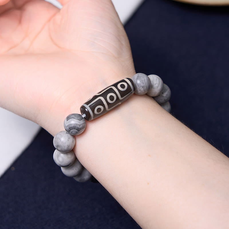 Buddha Stones Tibetisches Neun-Augen-Dzi-Perlen-Picasso-Jaspis-Positives Armband