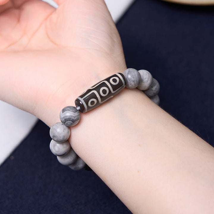 Buddha Stones Tibetisches Neun-Augen-Dzi-Perlen-Picasso-Jaspis-Positives Armband