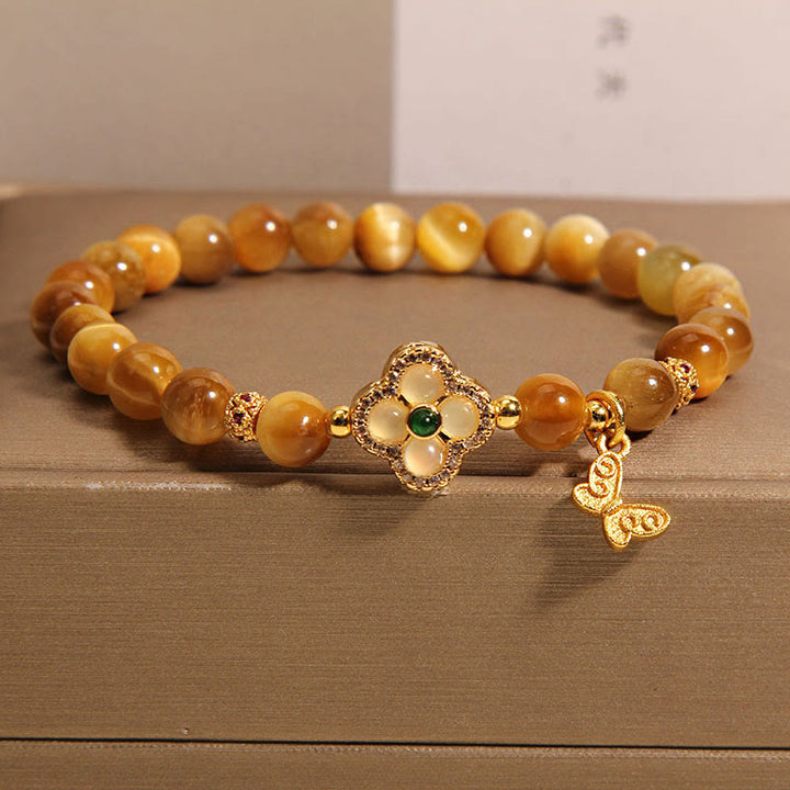 Buddha Stones Tigerauge-Armband mit vierblättrigem Kleeblatt und Schmetterlingsschutz - Tigerauge (Handgelenkumfang 14-16 cm) - image 0