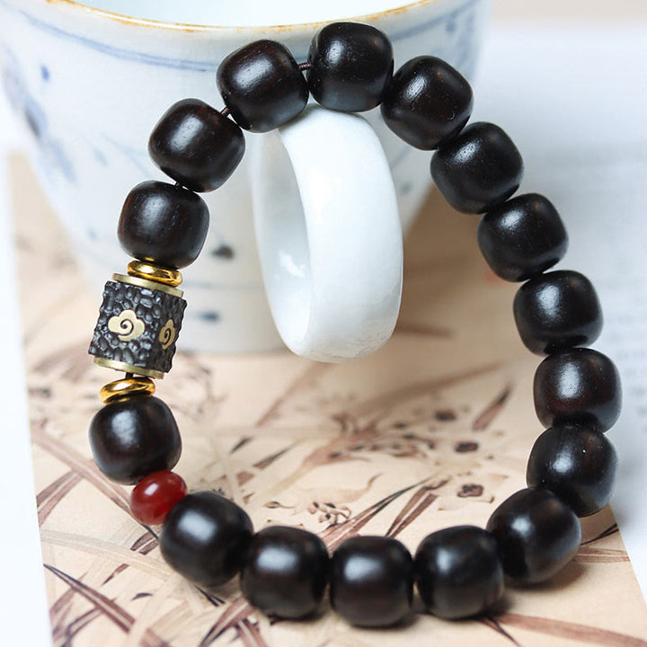 Buddha Stones Ebenholz Holz Glücksbringende Wolken Graviert Beruhigendes Armband