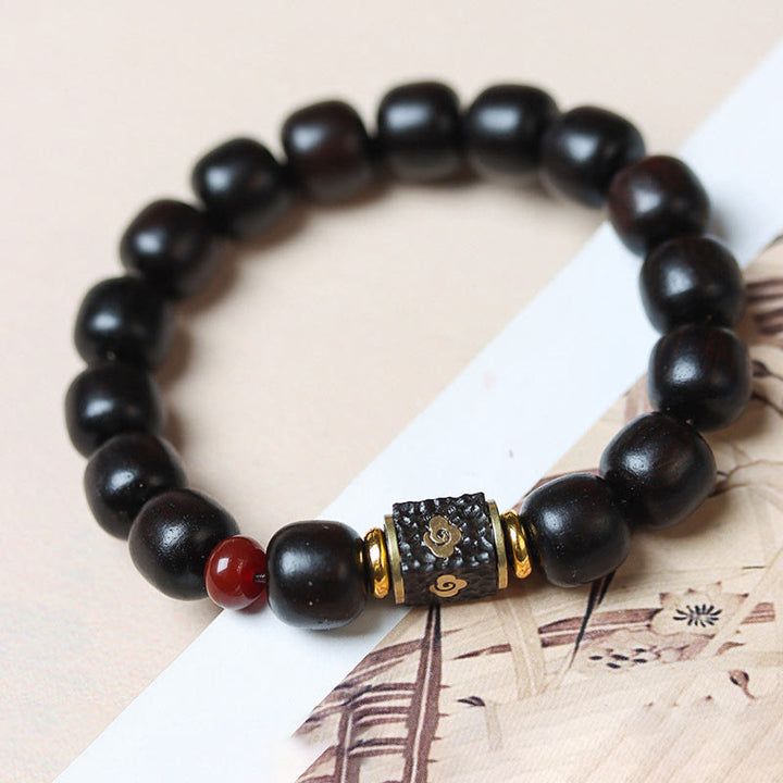 Buddha Stones Ebenholz Holz Glücksbringende Wolken Graviert Beruhigendes Armband