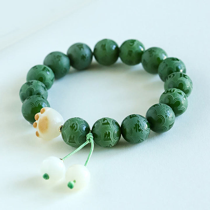 Buddha Stones Bodhisamen Om Mani Padme Hum geschnitztes Harmonie-Armband