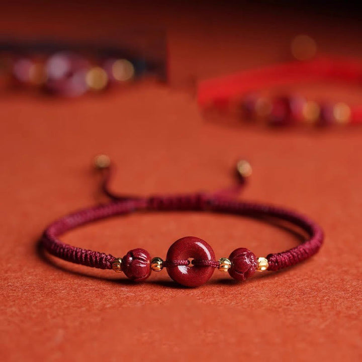 Buddha Stones handgefertigtes Zinnober Friedensschnalle Lotus Ruhige Segnung geflochtenes Seil Armband