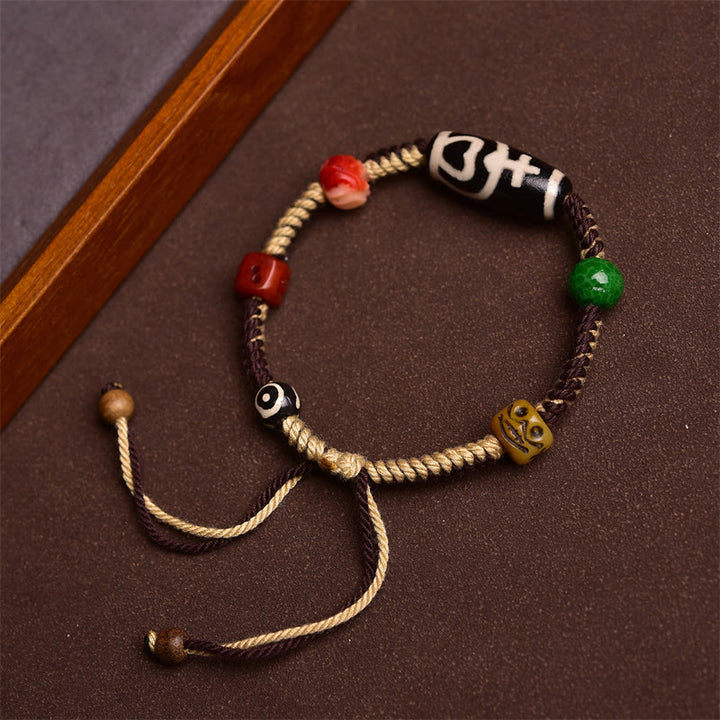 Buddha Stones Handgefertigtes Tibetisches Dzi-Perlen Reichtums Geflochtenes Seil Armband