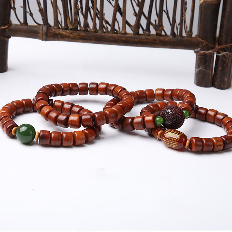 Buddha Stones Tibetische Knochenperlen Dreiäugige Dzi-Perle Schafshorn Roter Achat Stärkearmband