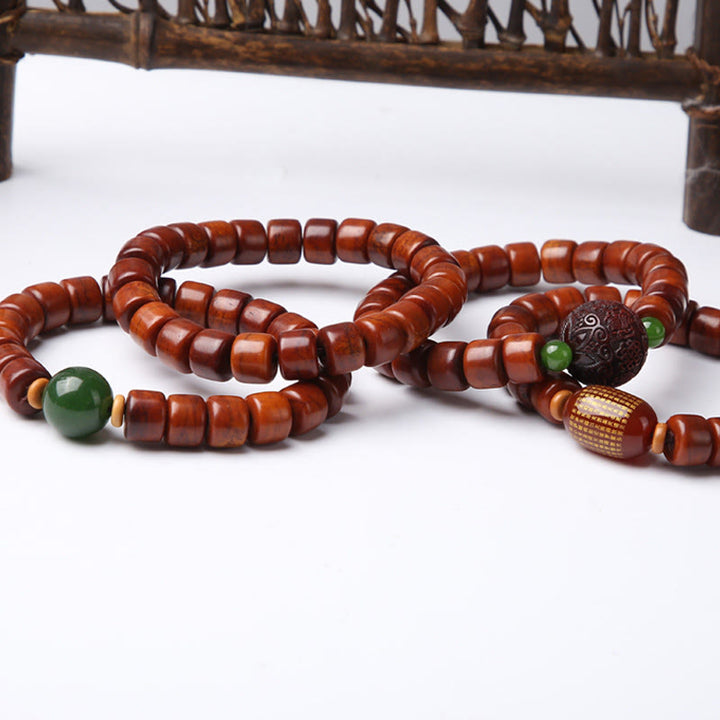 Buddha Stones Tibetische Knochenperlen Dreiäugige Dzi-Perle Schafshorn Roter Achat Stärkearmband