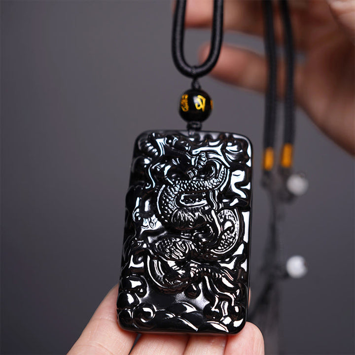 Buddha Stones Rechteckiger Drachenanhänger aus natürlichem schwarzem Obsidian mit Gravur – ein Symbol für Erfolg an einer Halskette - Dragon 62 mm × 39 mm - image 0