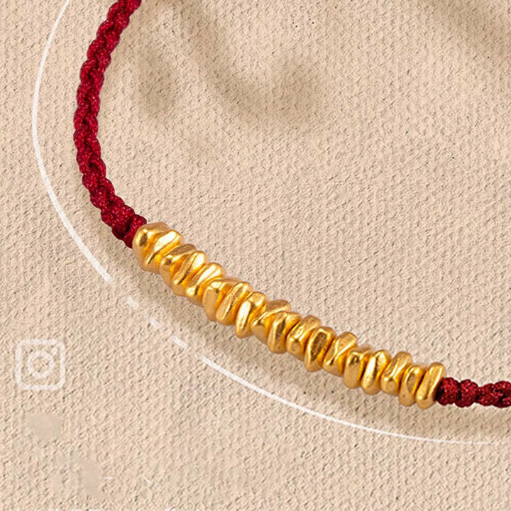 Buddha Stones ​​999 Gold Kleine Goldstücke Design Handgefertigtes Schutzarmband aus geflochtenem Seil - Kirschrot (Gold, ca. 0,75 g) - 21 cm - image 8