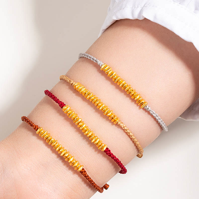 Buddha Stones ​​999 Gold Kleine Goldstücke Design Handgefertigtes Schutzarmband aus geflochtenem Seil - image 1