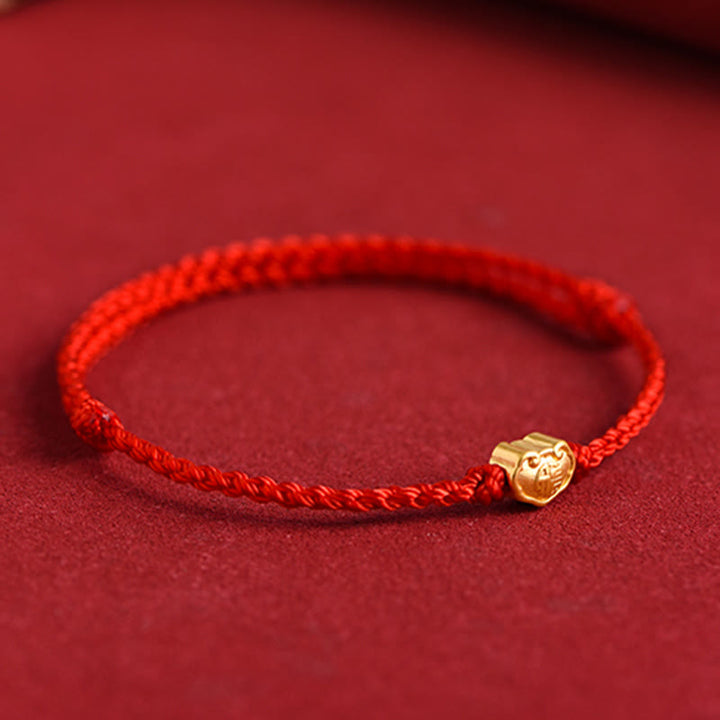 Buddha Stones 999 Gold Chinesischer Schloss-Charme Fu Charakter Schutz Handgemachtes Seil-Armband